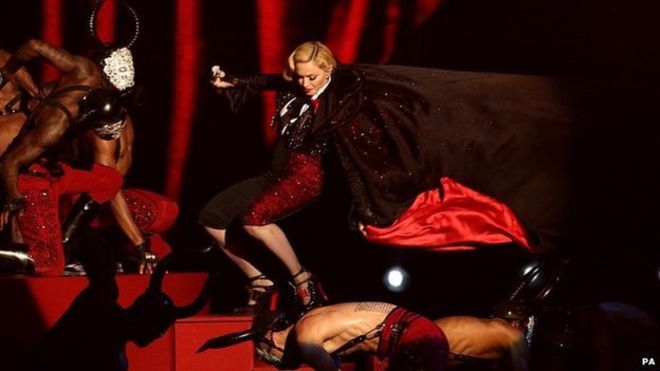 Madonna falls on stage during Brit Awards performance. OUCH!!!