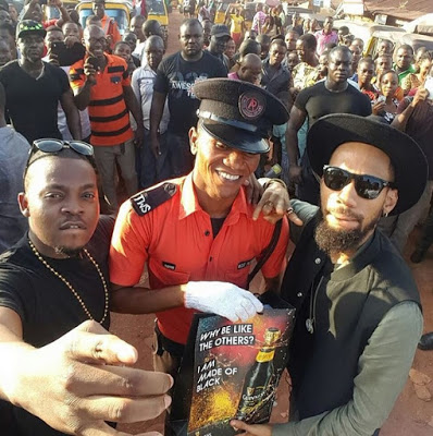 Olamide & Phyno Pay Surprise Visit To A Traffic Warden In Lagos